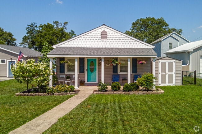 Quaint Cottage style home located in the Riviera Beach neighborhood.
