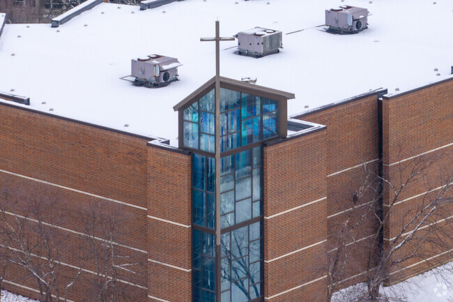 A stained glass detail of St James The Apostle School.