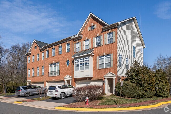 Spacious townhomes with attached garages are sprinkled throughout Newington Forest.