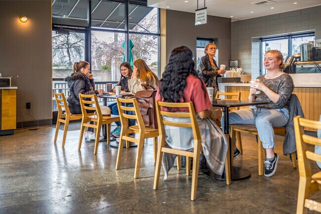Some girlfriends are spending a morning having coffee at Starbucks in North Highlands.