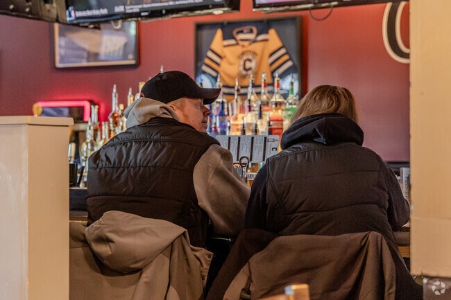 People enjoy coming to Christopher's Tavern in Sixteen Acres, MA, with friends to have fun.