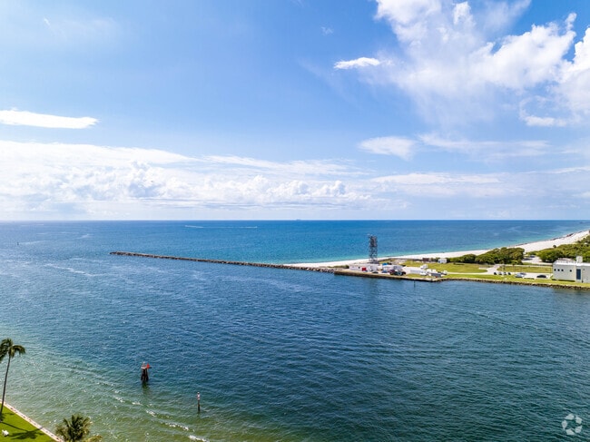 A pristine beach edges its way out into the ocean in the Harbour Isles neighborhood.