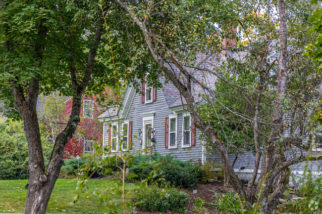 Other home options in Hampden include Cape Cod hidden in the woods.