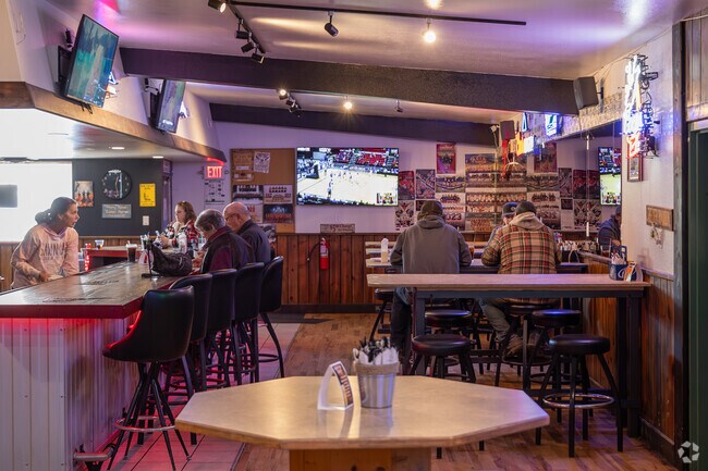 Locals gather to eat and drink at Willys Bar in Worden, fostering community bonds.