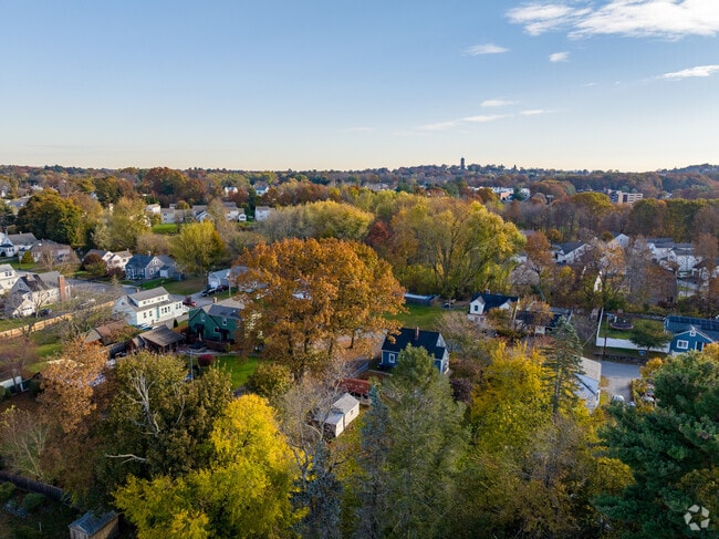 Looking East, the homes of Downtown Methuen are adjacent to the Merrimack River.