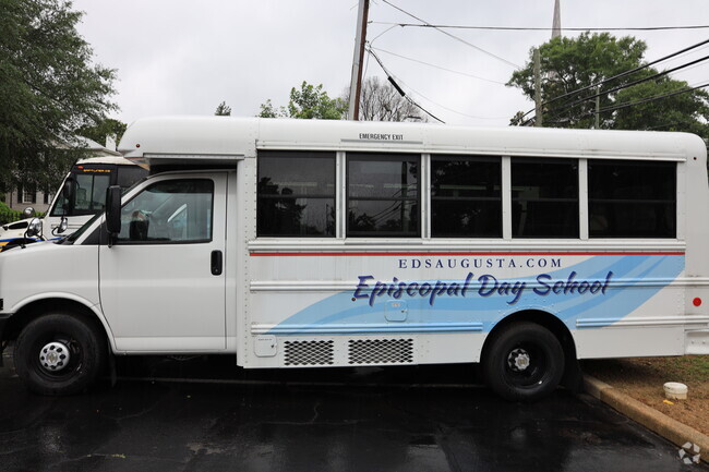 A small bus transports kids to and from Episcopal Day School in Summerville Augusta, GA.