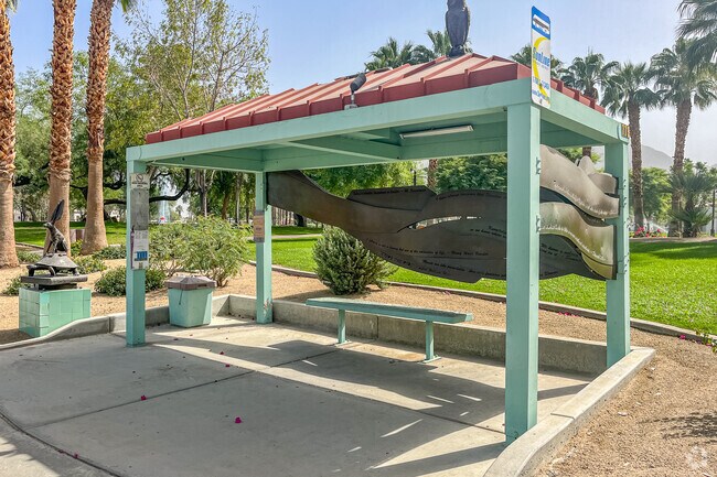 The bus stop is near in the neighborhood of Hideaway.