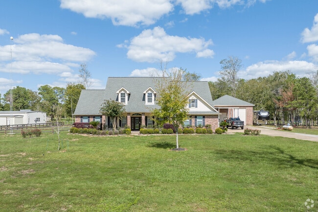 Expansive homes on acreage are typical in Liverpool.