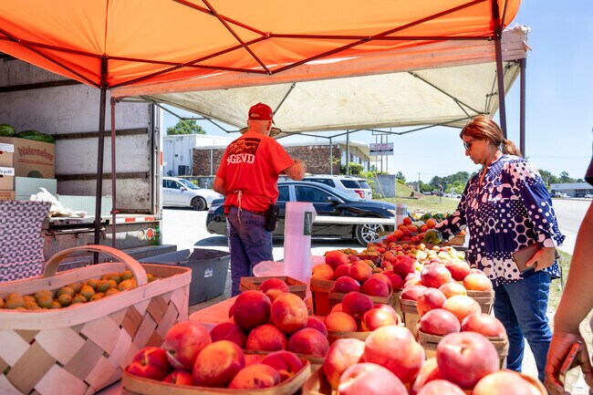 A local farmer sells his fresh produce at a roadside stand in College Place.