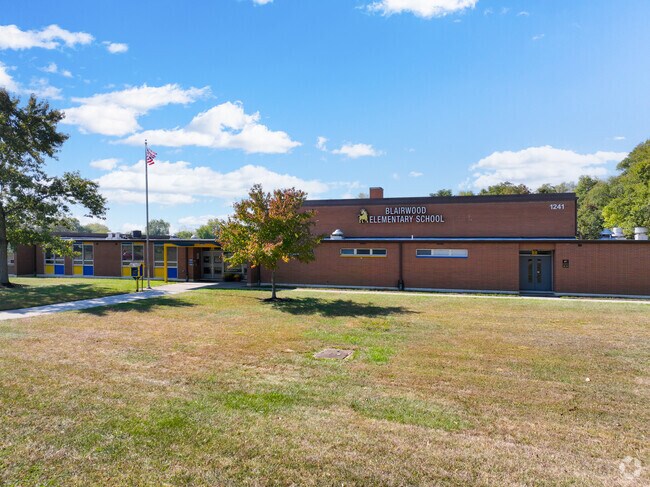 Enroll at the Blairwood Elementary School.
