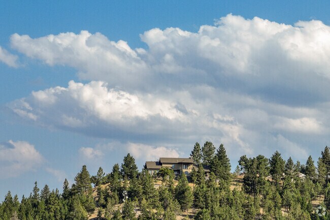 A mountain-top home in Jefferson City offers stunning panoramic views.