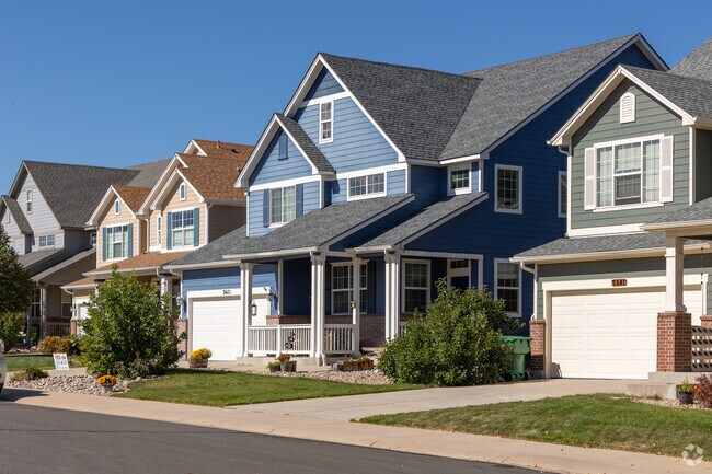 Colorful homes with covered porches are quite popular in Terrain.