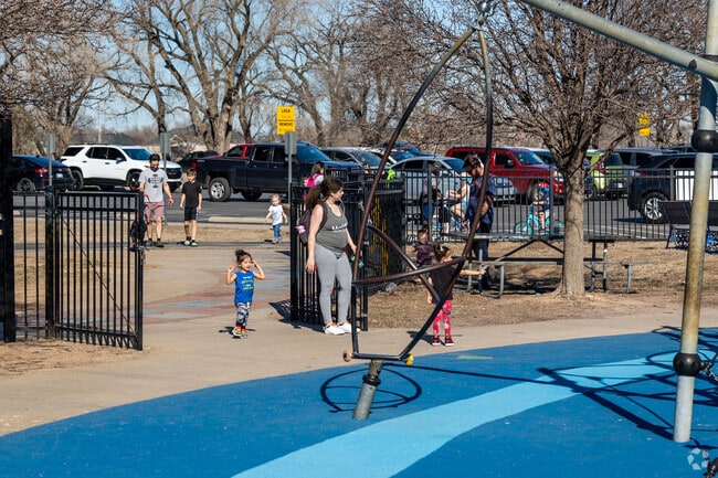 Kids love to play at the Sedgwick County Park Boundless Playground by Indian Hills Riverbend.