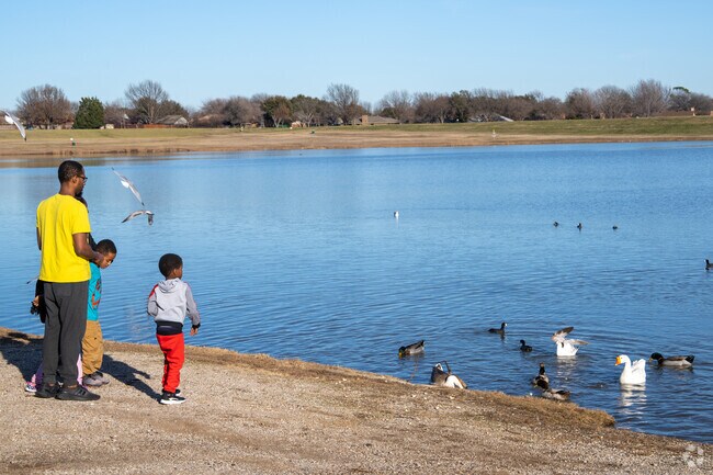 Feeding the birds at North Lakes Park is always a fun time for Rayzor Ranch residents.