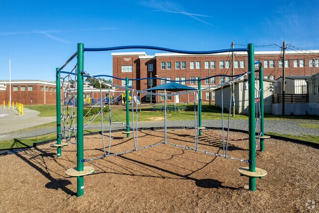 Students at Ballantyne Elementary in Ballantyne, are free to climb the jungle-gym.