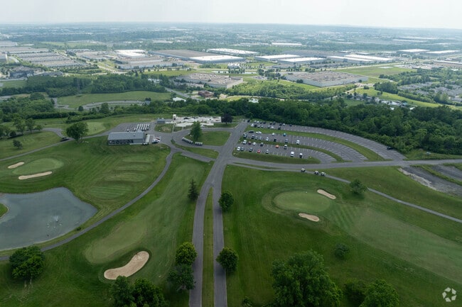 Residents play golf at The Beckett Ridge Golf Club in Beckett Ridge.