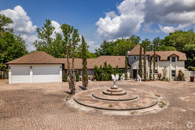 Two-story Spanish revivals are scattered around Pine Lake Estates.