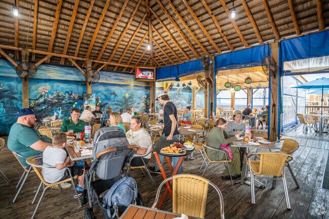 Residents can stop by the West End Marina, in Pointe West, for drinks and food.