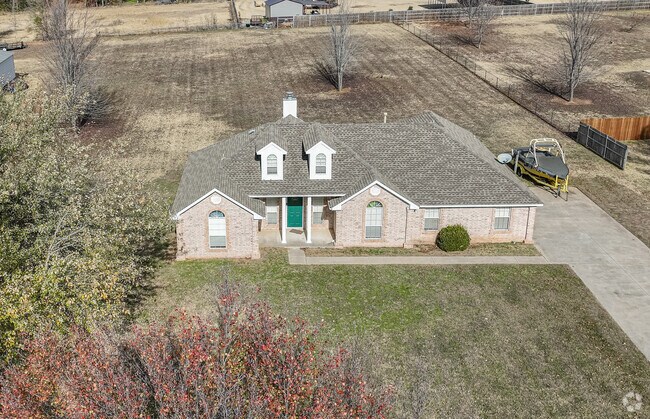 A perfect cape cod with plenty of land stands proudly in Slaughterville.