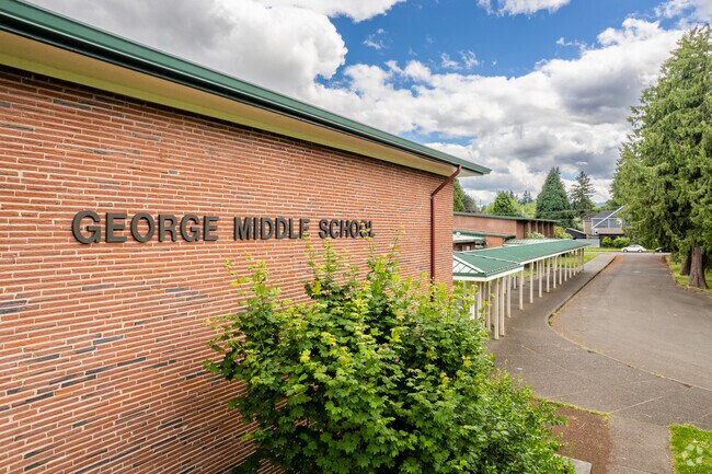 School sign on front of building