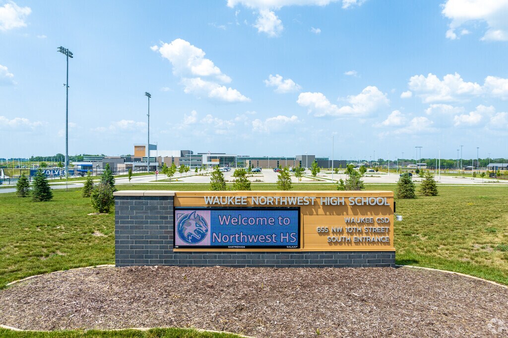 Northwest High School's signage stands proudly in front of the school campus.