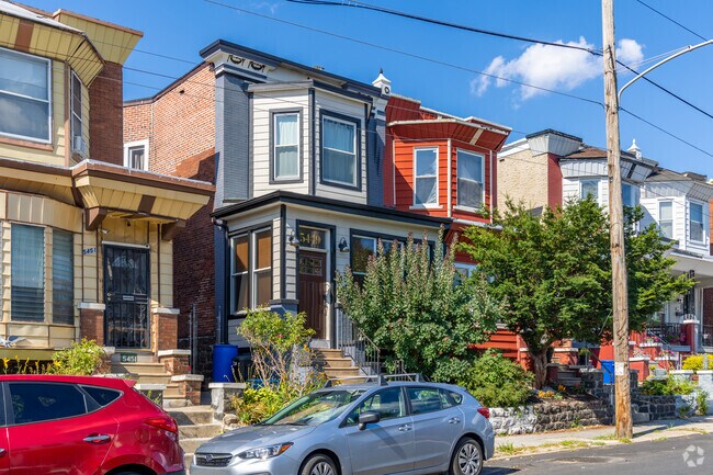 Colorful facades stand out on the residential streets of Kingsessing.