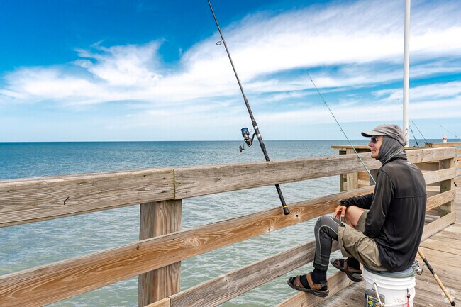 Fish off the pier into the Atlantic Ocean at Daytona Beach Shores.