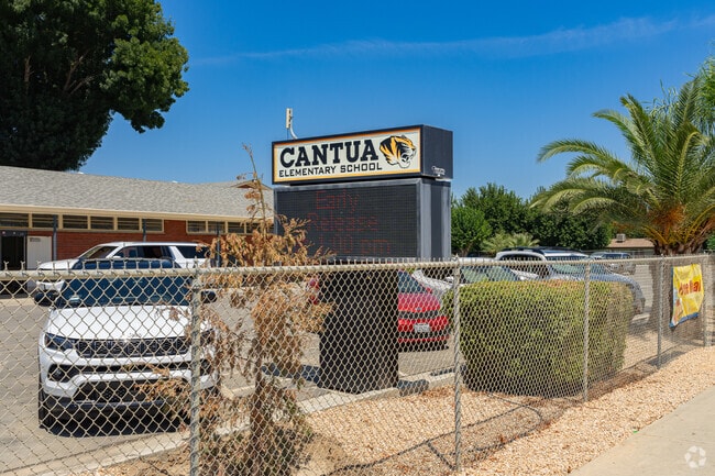 A lighted marquee at the entrance to Cantua Elementary School informs parents of events.