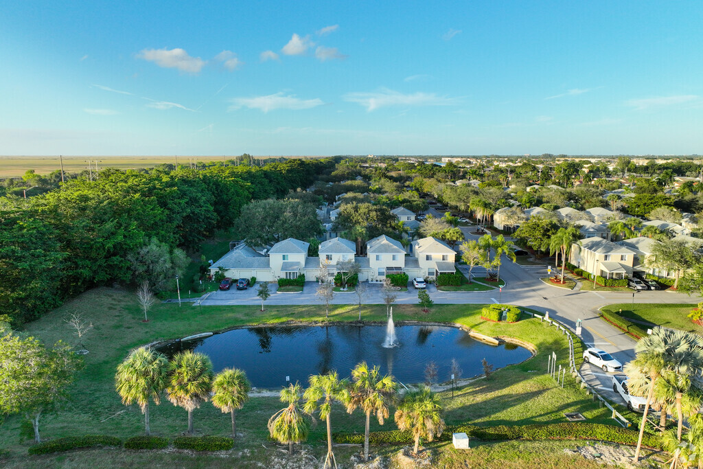 Locals love to see the morning sun resting on Woodland Lakes by The Mainlands of Tamarac Lakes in Florida.