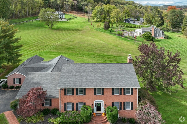 Homes in Oregon Ridge come in many different sizes and styles, such as this colonial model.