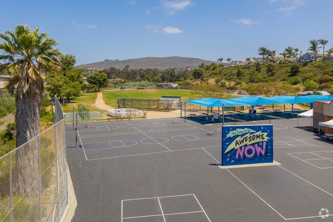 Mission Estancia has basketball courts and covered seating for outdoor relaxation.