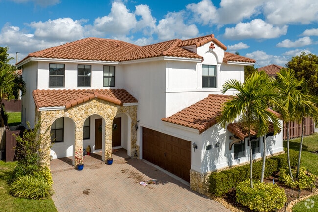 Spanish eclectic-style homes are found throughout Fontainebleau Park West.