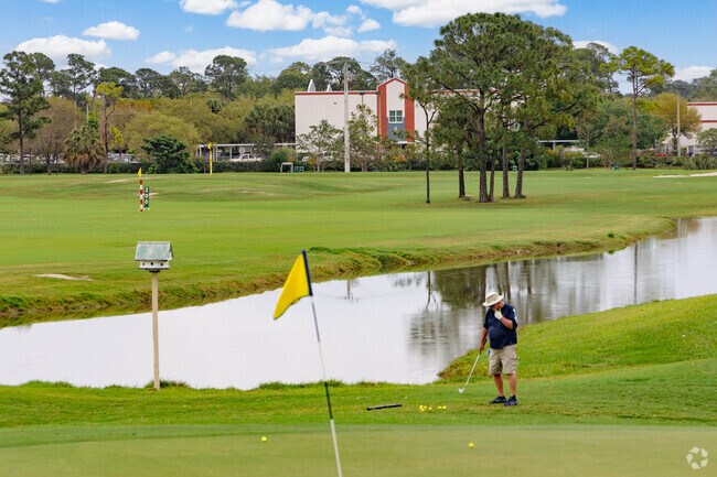 Abbey Park golfer perfecting his swing on nearby Okeeheelee Park's greens.
