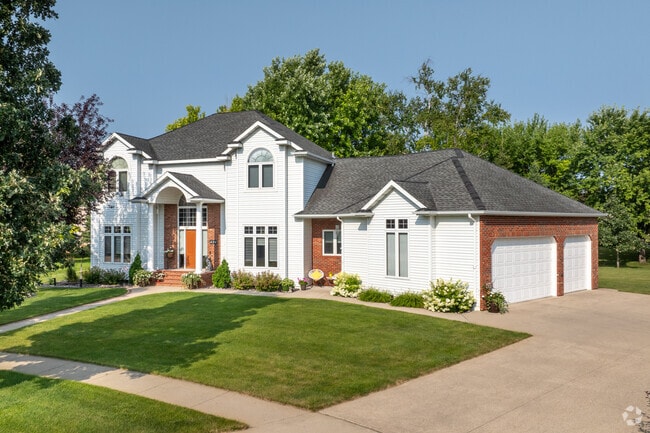 Many of the two-story homes in River Drive are more like grand estates, with large yards.
