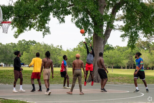 Southern Oaks residents enjoy the basketball courts at nearby Cypress Grove Park.