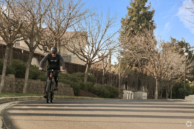 Cyclist in action Enjoying Deer Ridge-Marsh Creek's scenic routes.