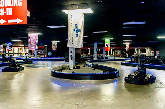 People race go-karts at High Caliber Karting and Entertainment in Okemos.