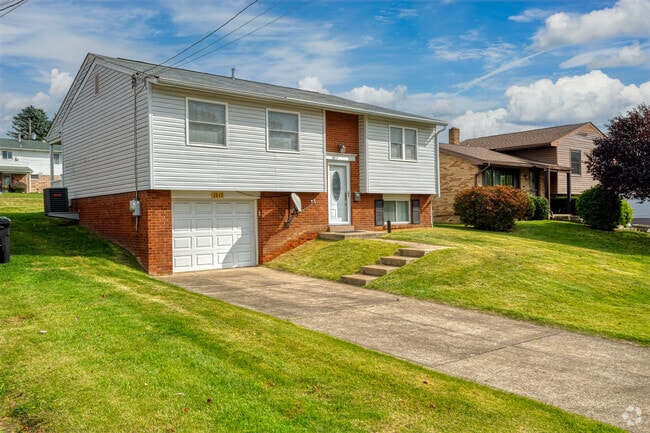 Split-level homes are popular in Conway and have garages attached underneath.