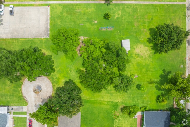 Enjoy a picnic in the shade underneath any of the large oak trees at Shady Oak Park in South Side.