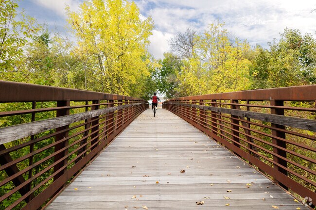 A bridge carries bikers and hikers over the wetlands of Fanno Creek Greenway in Denney Whitford.