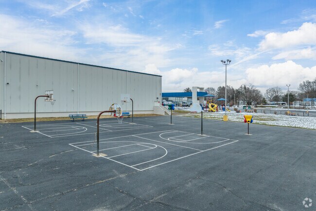Coventry Elementary School has a basketball court for recess students can play on.