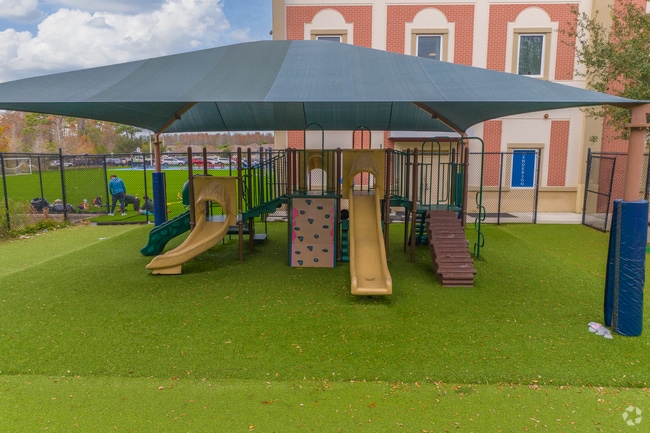 Henderson Hammock Charter School features a shaded playground.