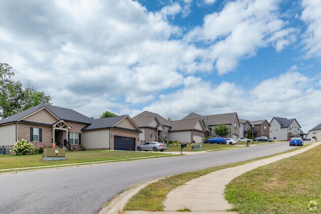 Craftsman homes are newly built and further set back into Apple Hollow.