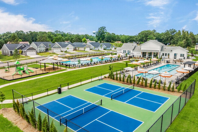 Enjoy a clubhouse & fitness center, zero-entry pool w/ lap lanes & sun shelf, recreational pool, fire pit, pickleball, playground & more, ready-to-use now. Schedule your visit to learn more.