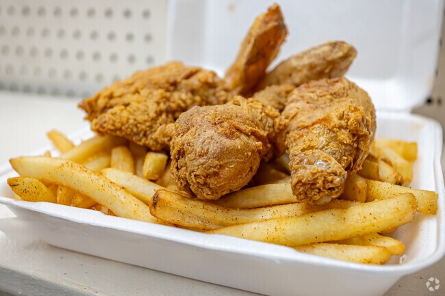 In Highland Farms the Triplet's Food Mart is known for its Blue Store Chicken.