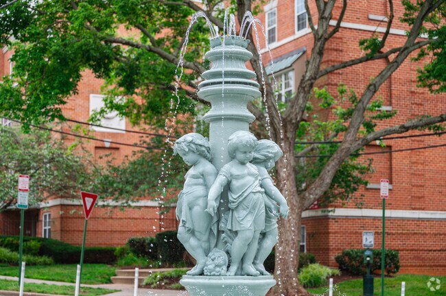 A beautiful fountain with playful children on Porter Street in McLean Gardens.