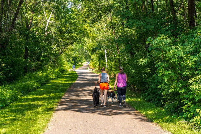 Parks and the 21‑mile Sunrise Prairie Trail encourage daily recreation in Stacy.