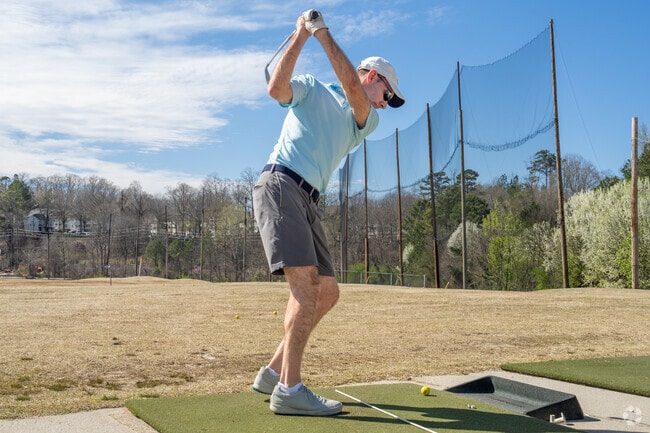 Residents can tee off at Steel Canyon Golf Club's driving range in Sandy Springs.