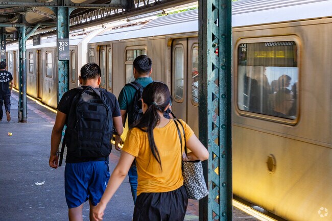 The number 7 Train goes through Corona to Hudson Yards in Manhattan.