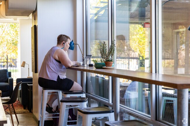 Peabody Park coffee lovers find a seat at Tempest Coffee Collective with a river view.